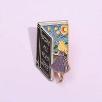 Whimsical Alice-Inspired “We’re All Mad Here” Book Pin